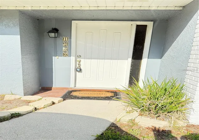 Photo 1 of Townhouse for sale at 1200 Abbey Crescent Ln, Clearwater, FL 33759 | MLS# TB8496633 | Listing updated on 2026-07-23