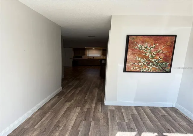 Photo 3 of Townhouse for sale at 1200 Abbey Crescent Ln, Clearwater, FL 33759 | MLS# TB8496633 | Listing updated on 2026-07-23
