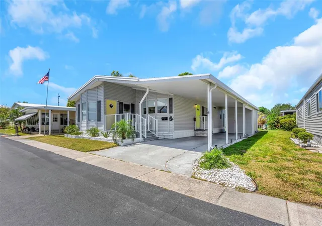 Manufactured home for sale at 106 Thatch Palm St W, LARGO, FL 33770 | MLS# TB8496638