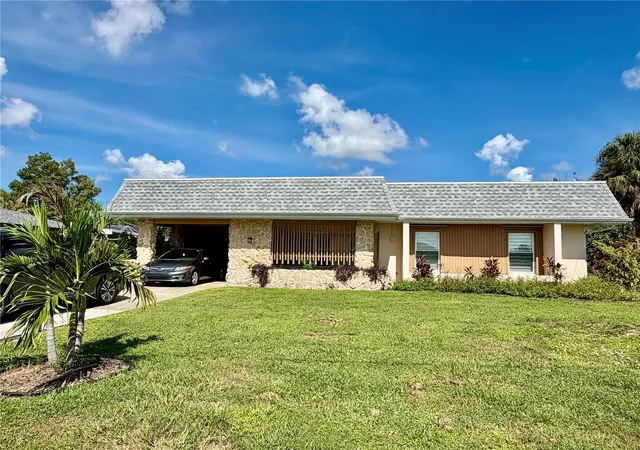 Single family home for sale at 1385 Harmony Dr, PORT CHARLOTTE, FL 33952 | MLS# TB8496696