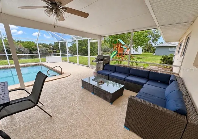 Photo 3 of Single family home for sale at 1385 Harmony Dr, Port Charlotte, FL 33952 | MLS# TB8496696 | Listing updated on 2026-10-08