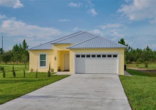1st image of 2581 Poinciana Dr, Indian Lake Estates, FL 33855 | MLS# TB8496751