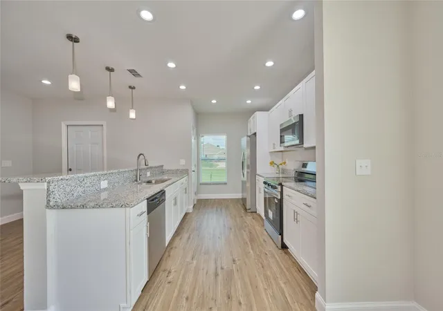 3rd image of 2581 Poinciana Dr, Indian Lake Estates, FL 33855 | MLS# TB8496751