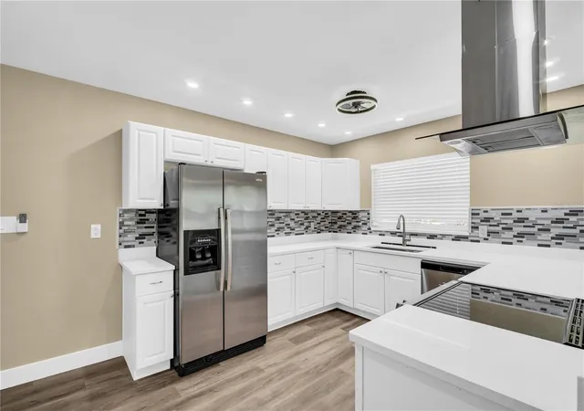 Photo 3 of Single family home for sale at 1001 Jasmine Way, Clearwater, FL 33756 | MLS# TB8496784 | Listing updated on 2026-09-14