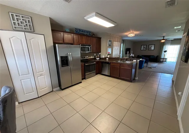 Photo 3 of Townhouse for sale at 1861 Chatham Pl Dr, Orlando, FL 32824 | MLS# O6398435 | Listing updated on 2026-08-23