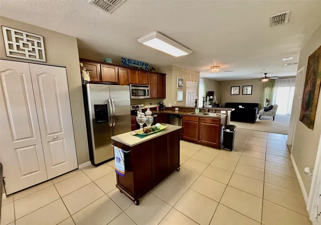 Photo 4 of Townhouse for sale at 1861 Chatham Pl Dr, Orlando, FL 32824 | MLS# O6398435 | Listing updated on 2026-08-23