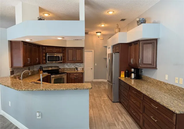 3rd image of 1616 Kinsmere Dr, Trinity, FL 34655 | MLS# W7884771