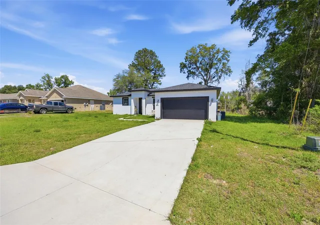 Photo 1 of Single family home for sale at 4411 Sw 132nd Place, Ocala, FL 34473 | MLS# OM722645 | Listing updated on 2026-09-26