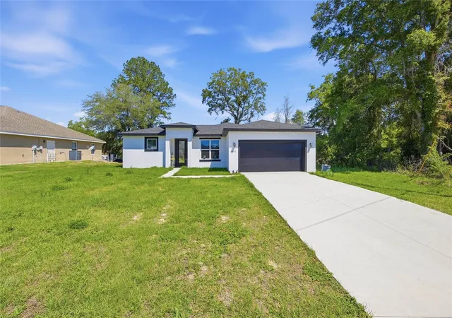 Photo 2 of Single family home for sale at 4411 Sw 132nd Place, Ocala, FL 34473 | MLS# OM722645 | Listing updated on 2026-09-26
