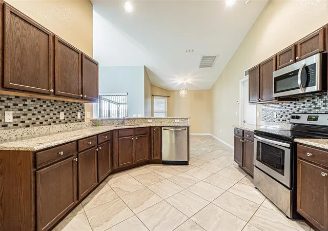 4th image of 1311 Evergreen Park Cir, Lakeland, FL 33813 | MLS# TB8496948