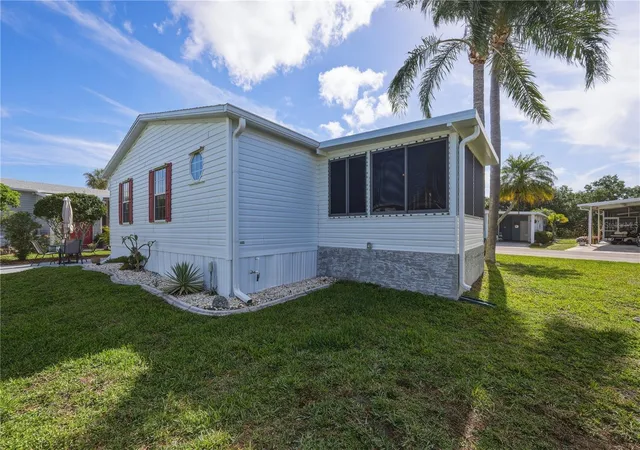 Photo 2 of Manufactured home for sale at 2100 Kings Hwy #401, Port Charlotte, FL 33980 | MLS# C7524793 | Listing updated on 2026-08-22