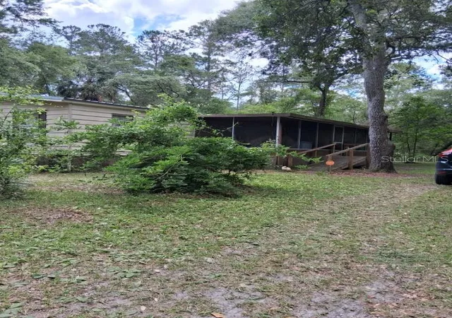 Photo 3 of Manufactured home for sale at 13600 Ne 166th Street, Fort Mc Coy, FL 32134 | MLS# O6398820 | Listing updated on 2026-09-18