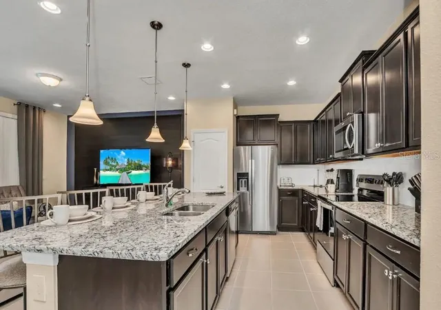 Photo 1 of Townhouse for sale at 2407 Dubai St, Kissimmee, FL 34747 | MLS# O6398836 | Listing updated on 2026-10-20