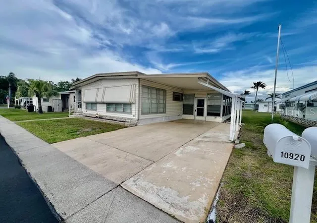 Photo 2 of Manufactured home for sale at 10920 Independence Dr, Port Richey, FL 34668 | MLS# W7884810 | Listing updated on 2026-07-25