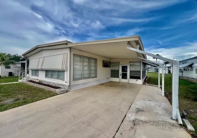 Photo 4 of Manufactured home for sale at 10920 Independence Dr, Port Richey, FL 34668 | MLS# W7884810 | Listing updated on 2026-07-25