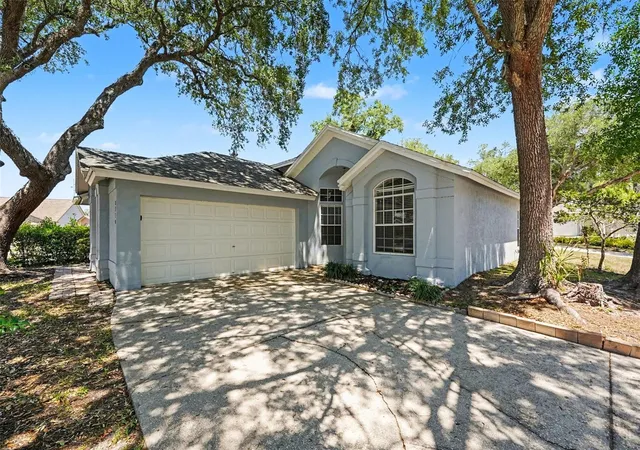 1st image of 8710 Triple Oaks Rd, Temple Terrace, FL 33637 | MLS# O6398871