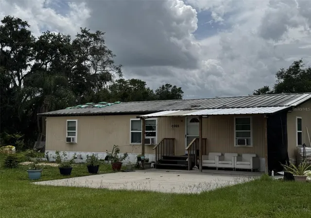 Photo 3 of Manufactured home for sale at 4008 Pine Ln, Haines City, FL 33844 | MLS# TB8497507 | Listing updated on 2026-07-07