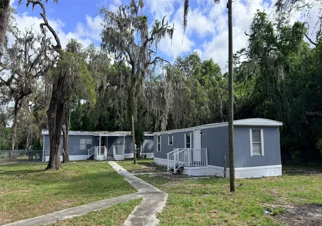 1st image of 10920 10928 Malati St, New Port Richey, FL 34654 | MLS# O6398988