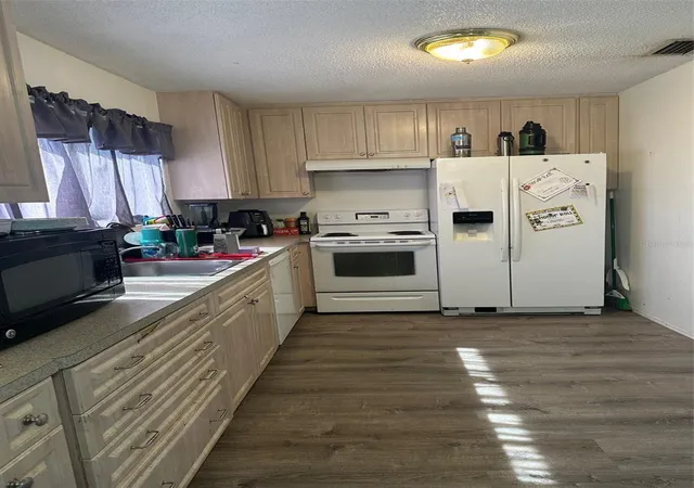 Photo 2 of Single family home for sale at 3066 Auburn Blvd, Port Charlotte, FL 33948 | MLS# C7524826 | Listing updated on 2026-09-05