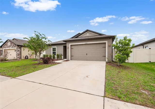 Photo 2 of Single family home for sale at 12960 Conquistador Loop, Spring Hill, FL 34610 | MLS# TB8497605 | Listing updated on 2026-07-21