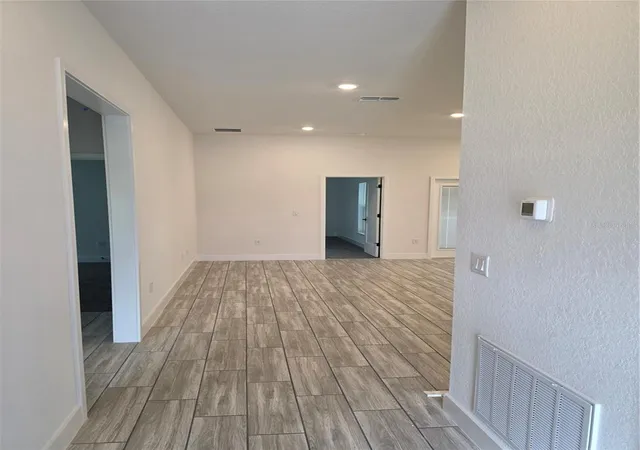 Photo 3 of Single family home for sale at 12460 Langley Dr #Lot 83, Spring Hill, FL 34609 | MLS# OM722789 | Listing updated on 2026-09-08