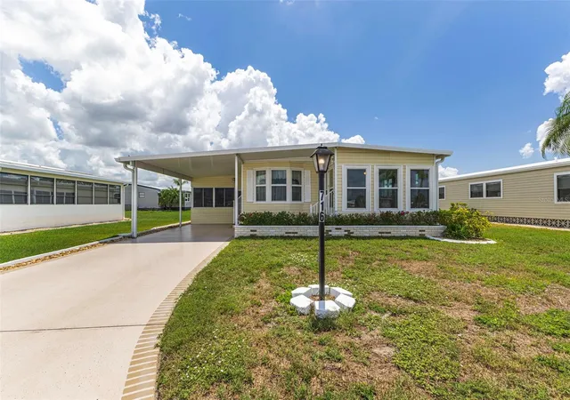 Photo 1 of Manufactured home for sale at 716 Sanchez Cir, North Port, FL 34287 | MLS# TB8497659 | Listing updated on 2026-09-22