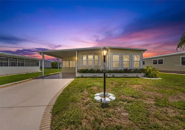 Photo 2 of Manufactured home for sale at 716 Sanchez Cir, North Port, FL 34287 | MLS# TB8497659 | Listing updated on 2026-09-22
