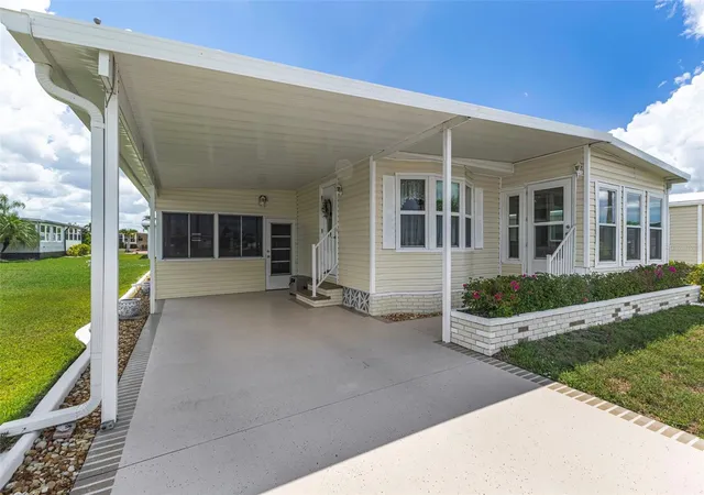 Photo 3 of Manufactured home for sale at 716 Sanchez Cir, North Port, FL 34287 | MLS# TB8497659 | Listing updated on 2026-09-22