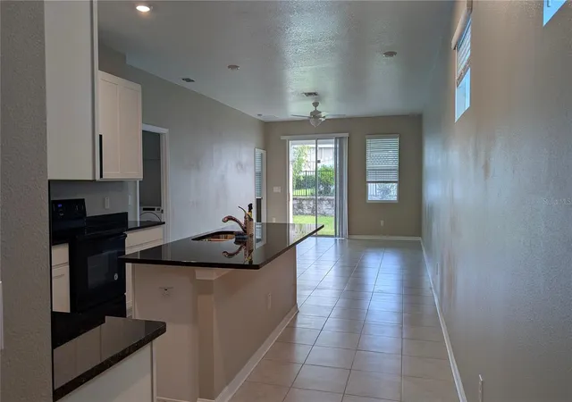 Photo 2 of Single family home for sale at 7635 Ashcroft Dr, Wesley Chapel, FL 33545 | MLS# TB8497723 | Listing updated on 2026-09-20