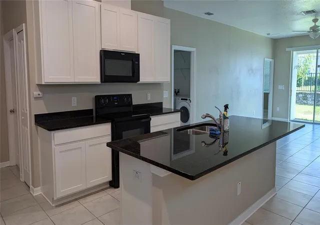 Photo 3 of Single family home for sale at 7635 Ashcroft Dr, Wesley Chapel, FL 33545 | MLS# TB8497723 | Listing updated on 2026-09-20