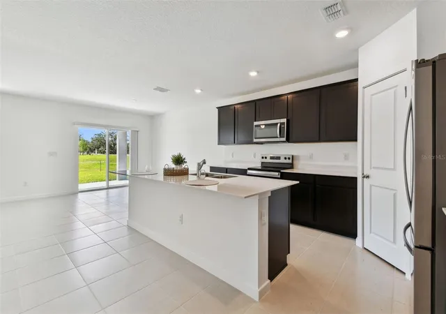 Photo 3 of Single family home for sale at 10818 Sapphire Breeze Cvs, Parrish, FL 34219 | MLS# TB8497927 | Listing updated on 2026-10-09
