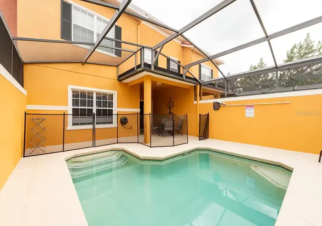 Photo 1 of Townhouse for sale at 8977 Coco Palm Rd, Kissimmee, FL 34747 | MLS# S5147914 | Listing updated on 2026-09-21