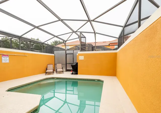 Photo 2 of Townhouse for sale at 8977 Coco Palm Rd, Kissimmee, FL 34747 | MLS# S5147914 | Listing updated on 2026-09-21