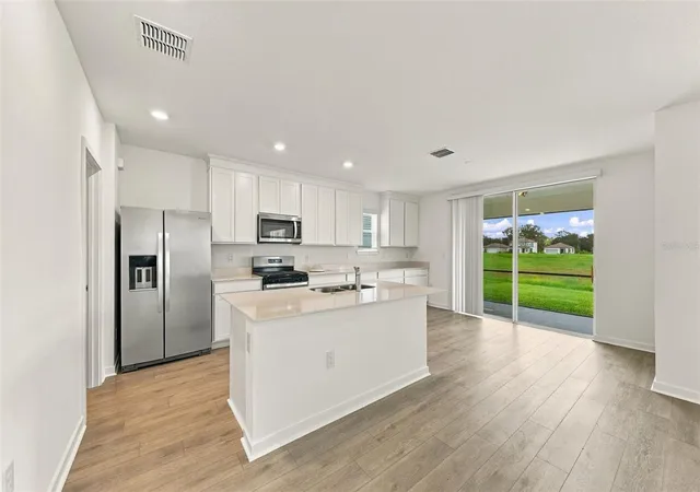 Photo 2 of Single family home for sale at 9185 Newmons Pl, Wildwood, FL 34785 | MLS# TB8498207 | Listing updated on 2026-09-30