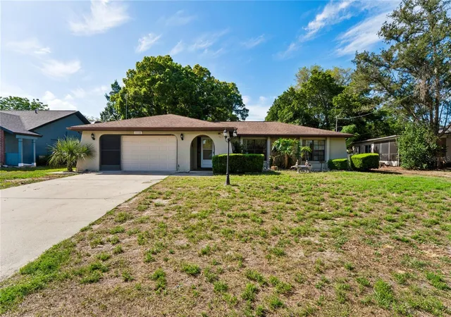 Photo 2 of Single family home for sale at 11122 Maderia St, Spring Hill, FL 34609 | MLS# W7884880 | Listing updated on 2026-10-06