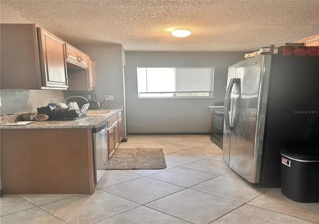 3rd image of 2938 Clark Rd #203, Sarasota, FL 34231 | MLS# O6399686