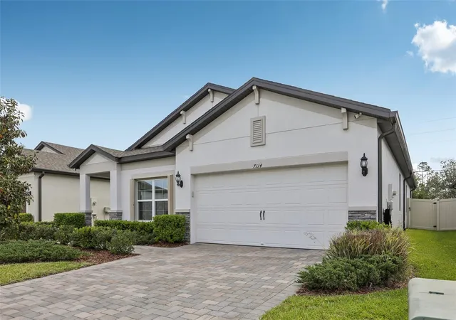 Photo 3 of Sale Pending at 7114 Gulf Cypress Ave, Land O Lakes, FL 34637 | MLS# TB8498568 | Listing updated on 2026-07-25