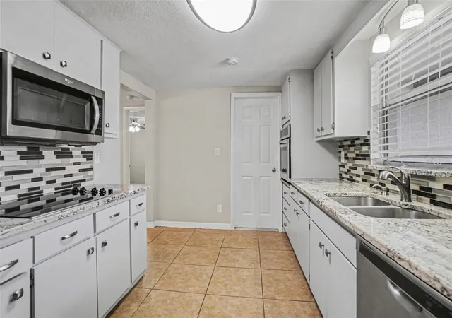 4th image of 8006 Mimosa Dr, Port Richey, FL 34668 | MLS# O6400076