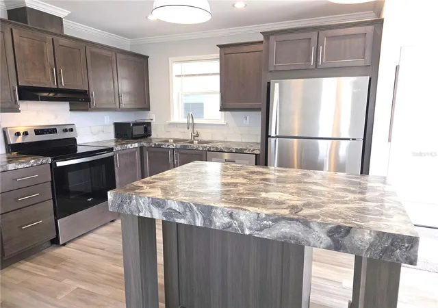 Photo 2 of Manufactured home for sale at 236 Wolverine Ave, North Port, FL 34287 | MLS# C7524992 | Listing updated on 2026-10-03