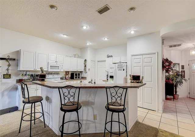 Photo 4 of Townhouse for sale at 14985 Alan Ct, Largo, FL 33771 | MLS# TB8499103 | Listing updated on 2026-09-24