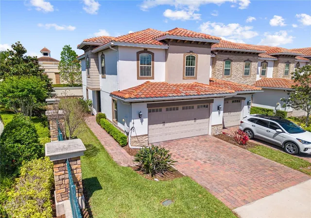Photo 1 of Townhouse for sale at 14100 Tarvin St, Orlando, FL 32832 | MLS# O6400447 | Listing updated on 2026-08-27