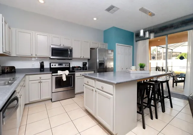 Photo 4 of Single family home for sale at 1315 Seasons Blvd, Kissimmee, FL 34746 | MLS# O6400453 | Listing updated on 2026-07-01