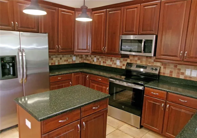 5th image of 11314 Oyster Bay Cir, New Port Richey, FL 34654 | MLS# TB8499431