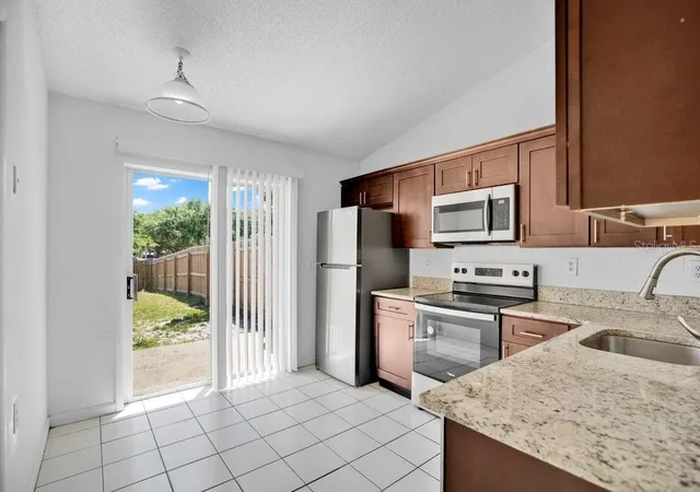 4th image of 2827 Coral Reef Dr, Orlando, FL 32826 | MLS# O6400580