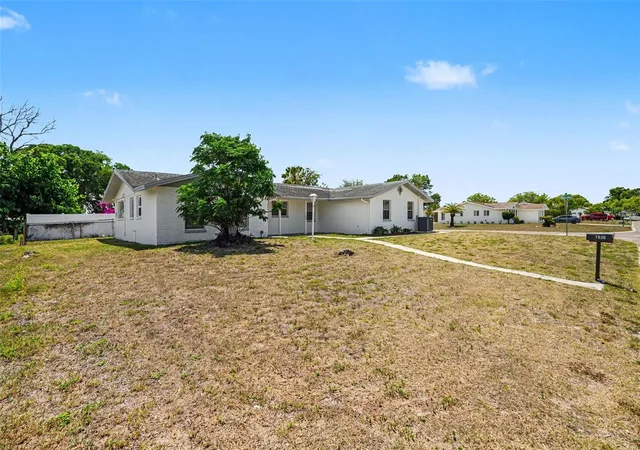3rd image of 7836 Lotus Dr, Port Richey, FL 34668 | MLS# O6400592
