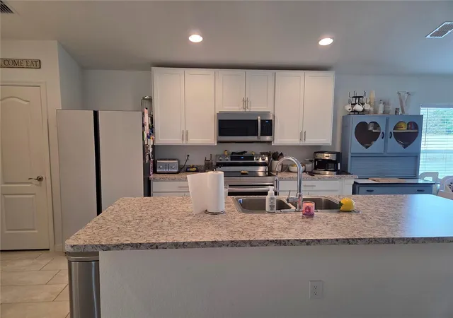 Photo 2 of Single family home for sale at 4570 Penkert Pl, Lakeland, FL 33811 | MLS# TB8499800 | Listing updated on 2026-05-23