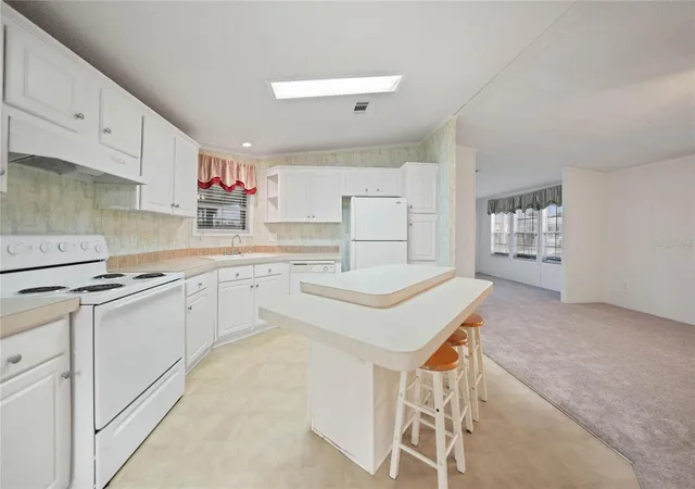 Photo 2 of Manufactured home for sale at 2100 Kings Hwy #517, Port Charlotte, FL 33980 | MLS# C7525114 | Listing updated on 2026-10-20
