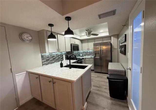 Listing Photo 1 - Condo for sale in building located at 21405 Olean Blvd, PORT CHARLOTTE, FL 33952 - Unit #521