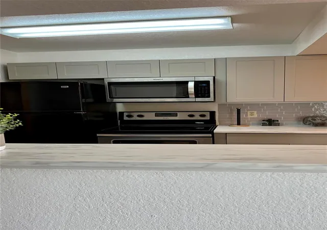 Listing Photo 4 - Condo for sale in building located at 11526 Westwood Blvd, ORLANDO, FL 32821 - Unit #723