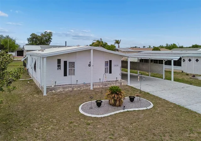 Photo 3 of Manufactured home for sale at 14131 Delsilver Dr, Brooksville, FL 34613 | MLS# TB8500056 | Listing updated on 2026-09-07